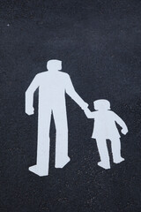 Swedish pedestrian crossing sign on asphalt
