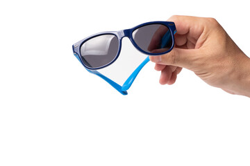 Man's hand holding blue sunglasses isolated on white background with clipping path.