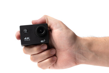 Man hand holding an action camera is highlighted on a white background.