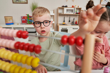 Preschool children using abacus to learn