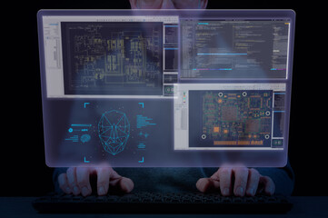 Man's hands on keyboard and virtual screen with Computer Aided Design software windows. Concept of...