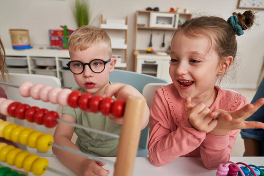 Preschool children using abacus to learn