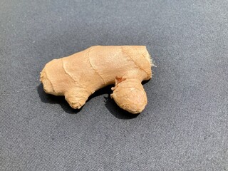Fresh ginger root isolated. raw ginger on whole background, sliced ginger with leaves. cut slices of ginger root. close up