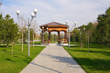 Wooden gazebo in the Khoja Doniyor (Saint Daniel) Park on the side of the Afrosiyab Hill in Samarkand, Uzbekistan