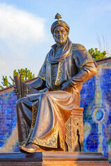 Fototapeta premium Statue of Mirzo Ulugbek (Ulugh Beg), a famous Timurid astronomer and mathematician in front of his observatory in Samarkand, Uzbekistan