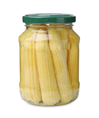 Tasty fresh yellow baby corns in glass jar isolated on white