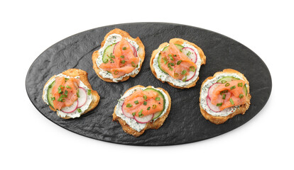 Tasty canapes with salmon, cucumber, radish and cream cheese isolated on white, top view