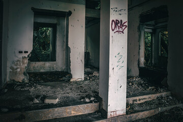 Old abandoned hotel. Shabby walls. Dirty floor. Dark corridors.