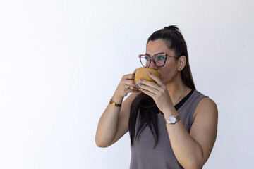 Portrait of entrepreneurial woman and mother having a cup of coffee