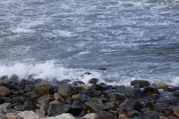 Ocean waves crashing on a rocky shore