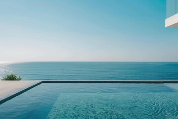 Obraz premium The luxurious terrace pool, surrounded by minimalist and modern design elements, offered residents an unparalleled sea view experience, epitomizing contemporary elegance and sophistication