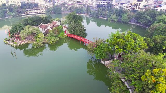 Hoan Kiem lake aerial drone view with ancient Ngoc Son temple and The Huc bridge in Hanoi, Vietnam