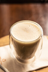 cup of coffee with milk in glass cup