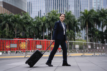 Confident Businesswoman Traveling in Urban Environment