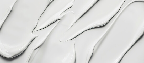 Obraz premium Large strokes of white paint on a white background 