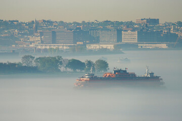 New York Harbor in the morning fog.