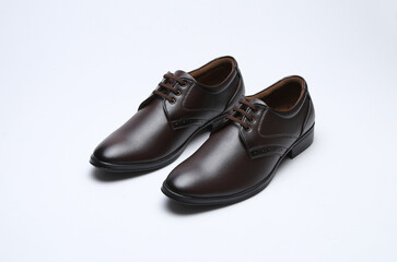 dark brown formal lace up shoes isolated on white background