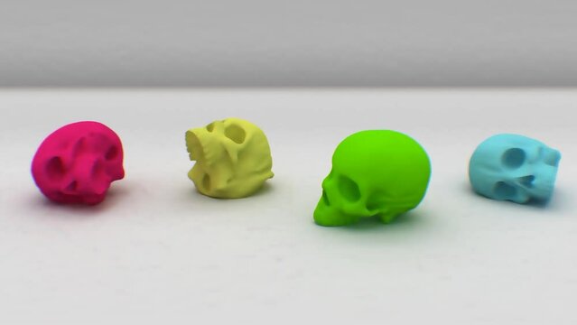 3d animation. falling rubber skulls