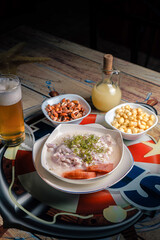 white ceviche with beer