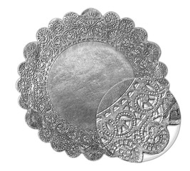 Silver confectionery napkin with decorative texture under magnifying glass. Hand drawn pencil sketch illustration