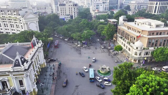 Aerial drone view of Hanoi cityscape on Trang Tien street, Hoan Kiem district.