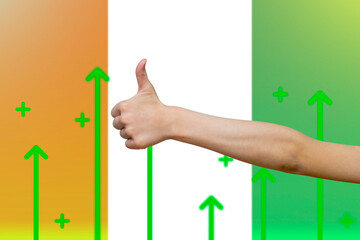 Ivory Coast flag with green up arrows, country statistics concept, increasing values and improving