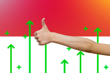 Monaco flag with green up arrows, increasing values and improving economy,  finger thumbs up front 