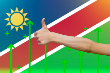 Namibia flag with green up arrows, country statistics concept, increasing values and improving 