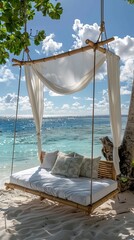 wooden swing with a mattress and pillows under a canopy on the tropical beach