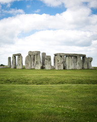 STONEHENGE, WILTSHIRE - JUNE 25 2021: Tourists amongst the standing stones on JUNE 25 2021 in...