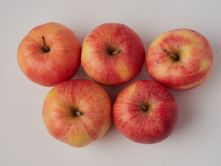Shiny red apples, isolated on white background.
