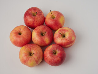 Shiny red apples, isolated on white background.