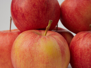 Shiny red apples, isolated on white background.