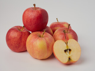 Shiny red apples, isolated on white background.