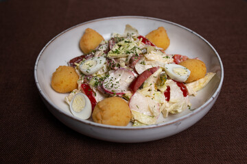 Vegetable Salad with Cherry Tomatoes, Cucumber, Radish, Carrot, Lettuce on Plate