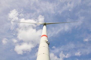 Wind turbines. Power generation. huge windmill against the sky