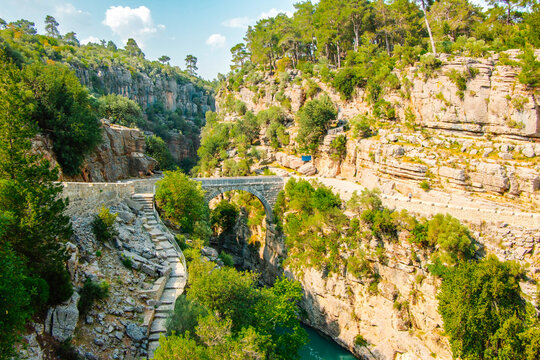 Aerial view of Oluk, the ancient arch bridge over the Koprucay river gorge in Koprulu National Park in Turkey.