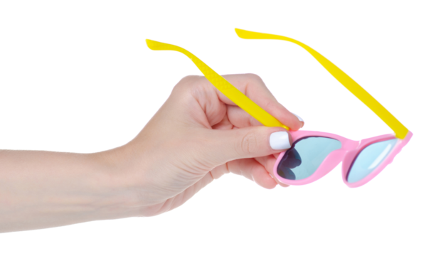 Pink sunglasses for girl baby in hand on white background isolation