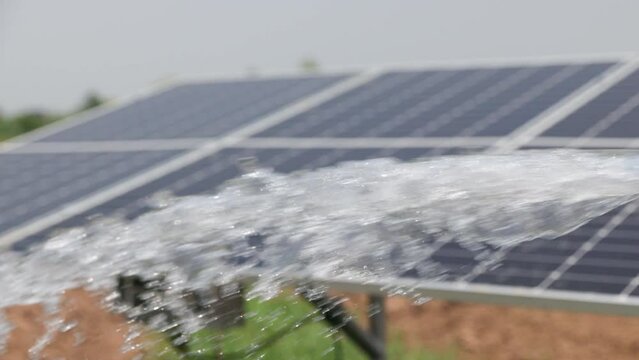 Solar panel for groundwater pump in agricultural field during drought by El Nino phenomenon. Slow motion.