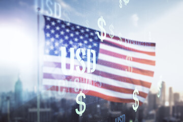 Double exposure of virtual USD symbols hologram on USA flag and blurry cityscape background. Banking and investing concept