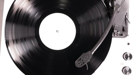 Vinyl retro record on DJ turntable record player. Black vinyl background with white screen in center. - Powered by Adobe