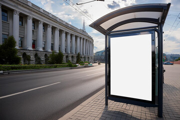 Clear Billboard in public place with blank copy space screen for advertising or promotional poster content, empty mock up Lightbox for information, blank display in station area with daylight