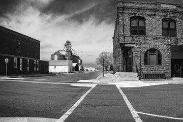 Crossroad in a small town of American West, a nostalgic rustic cityscape of Hartford, South Dakota,...