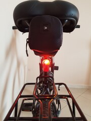 Rear red light on a mountain bike
