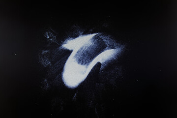 abstract white dust on a black background.
