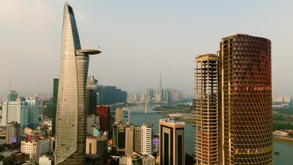 Aerial view of Bitexco Financial Tower and riverfront buildingsn Ho Chi Minh, Vietnam