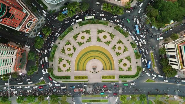 Aerial footage of the traffic in Me Linh Square in District 1, downtown Ho Chi Minh City, Vietnam
