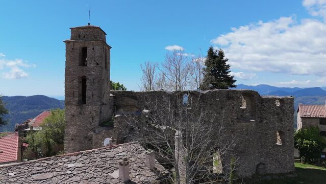 Bajardo Italy drone aerial video of a San Nicolo church old medieval town in the mountains