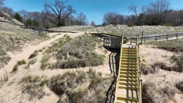 Panning from the shore to the beach access system.