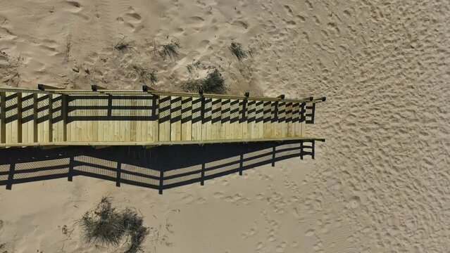 Still aerial of stairs on the dunes.